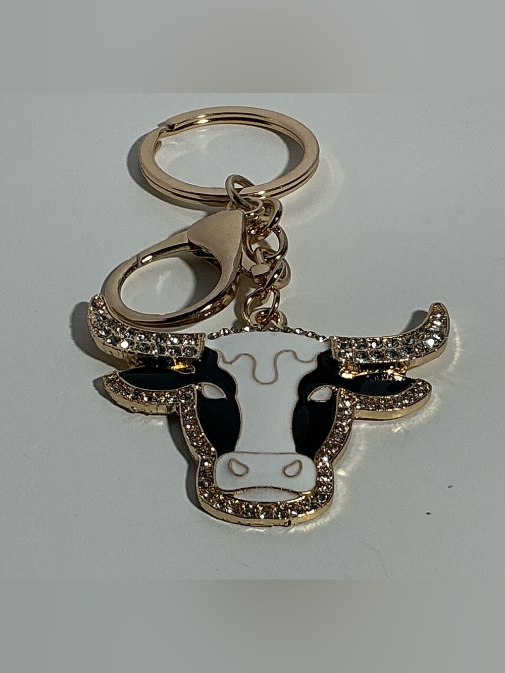 Gold-Tone Cow Head Keychain with Black & White Enamel